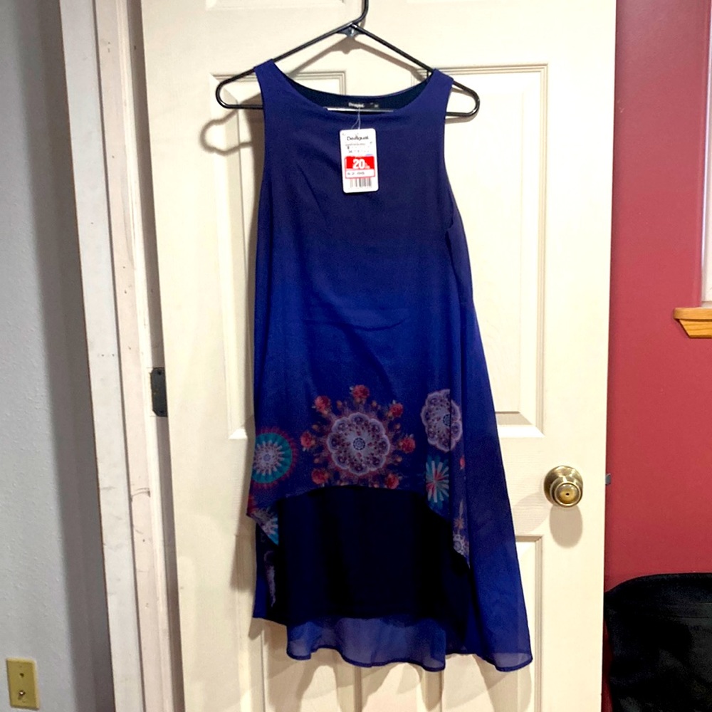 Desingual sleeveless lightweight dress.  Three layers. Rayon and Spandex